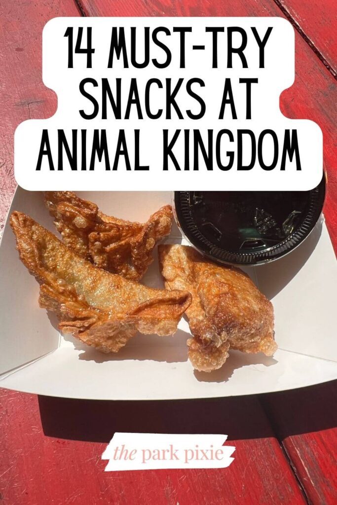 Photo of fried chicken dumplings with ponzu sauce from Mr. Kamal's at Disney's Animal Kingdom. Text overlay reads: 14 Must-Try Snacks at Animal Kingdom.