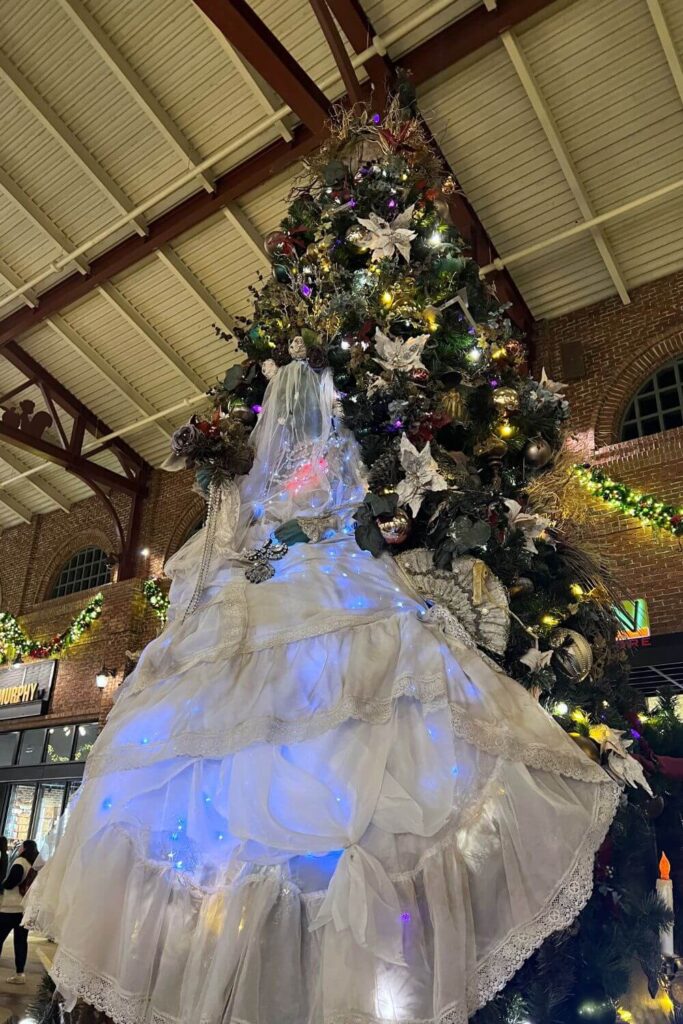 Photo of the Haunted Mansion themed Christmas tree at Disney Springs.